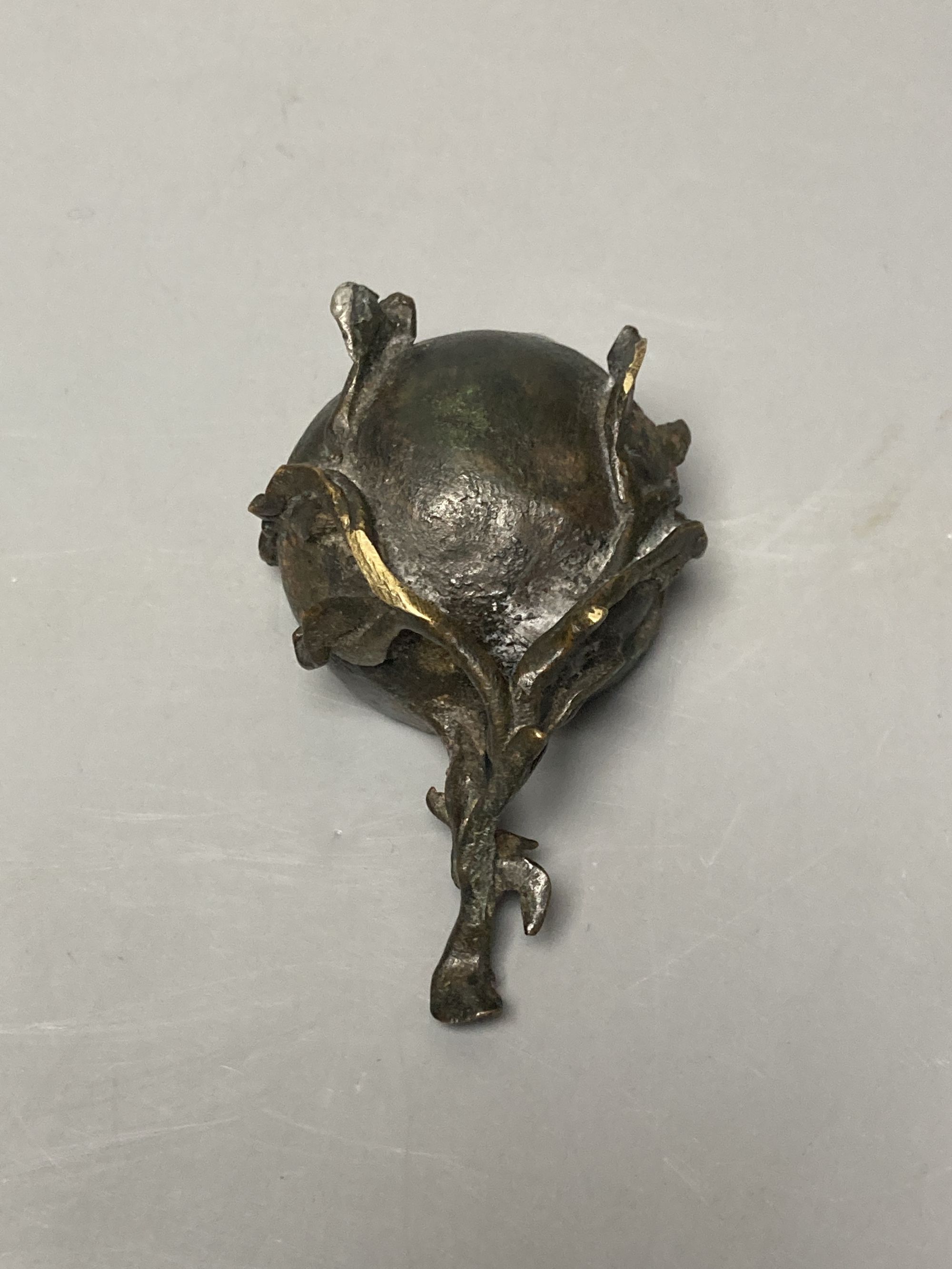 A Chinese Ming bronze peach shaped brush washer, length 9cm